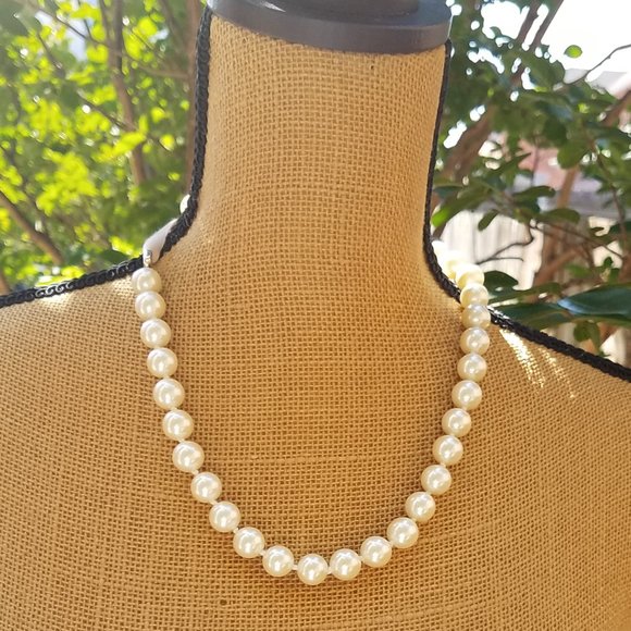 Unbranded Jewelry - Pearls with a Pink Ribbon Accent/Closure